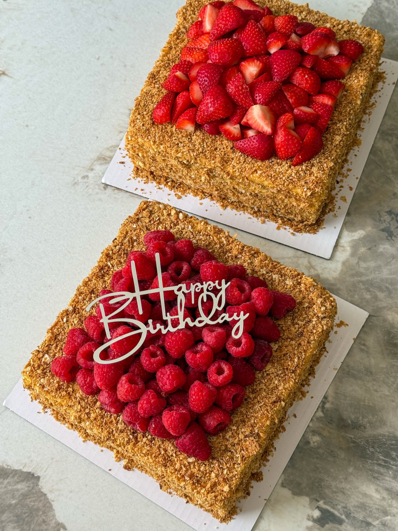 custom pink birthday cake with fresh berries near Chicago IL